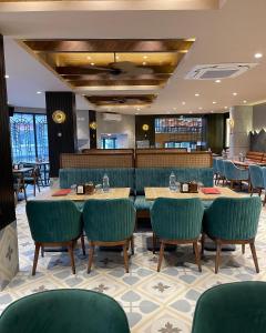 Restaurace v ubytování Sandoz Palm Retreat - Mall Road, Mussoorie