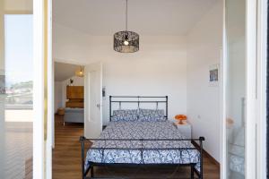 Posteľ alebo postele v izbe v ubytovaní La casa del Riccio
