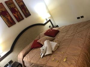 Letto o letti in una camera di Gullo Hotel