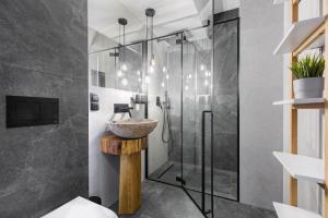 Kúpeľňa v ubytovaní Apartamenty Modrzejewskiej Zakopane + 37 fotografií