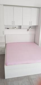 Postel nebo postele na pokoji v ubytování Apartman Nikolić 1