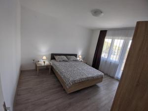 Krevet ili kreveti u jedinici u okviru objekta Apartman IKA Sokobanja