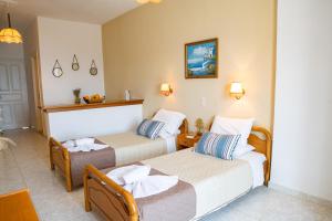 Кровать или кровати в номере Villa Bambas Resort