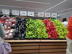 a store with a display of peppers and other vegetables at House ThoNi in Gornji Štoj