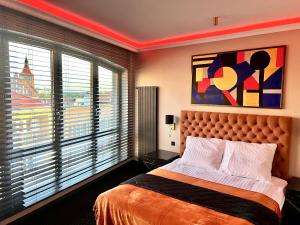 Posteľ alebo postele v izbe v ubytovaní Golden Apartments Centrum