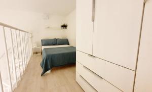 A bed or beds in a room at ALmare - Nice & Easy