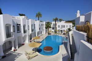 an aerial view of a hotel with a swimming pool at Yalinn Boutique Hotel in Yalıkavak +39 photos