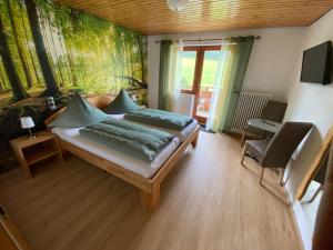 Säng eller sängar i ett rum på Pension Altvogtshof