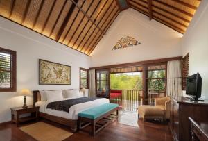 Postel nebo postele na pokoji v ubytování Korurua Dijiwa Ubud