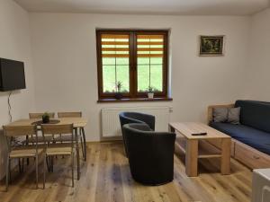 TV a/nebo společenská místnost v ubytování Apartmány u Petra