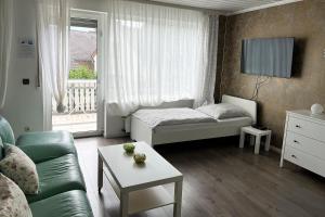 Posedenie v ubytovaní cozy worker apartments Niederkassel