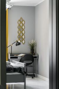 Łóżko lub łóżka w pokoju w obiekcie Chociszewskiego Apartment Poznań by Noclegi Renters