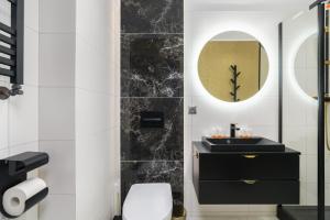 Łazienka w obiekcie Chociszewskiego Apartment Poznań by Noclegi Renters