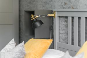 Łóżko lub łóżka w pokoju w obiekcie Chociszewskiego Apartment Poznań by Noclegi Renters