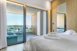 Posteľ alebo postele v izbe v ubytovaní SAVUS Boutique Hotel
