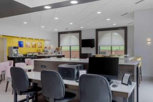 an office with a desk with a computer and chairs at Comfort Suites Mt Juliet-Nashville Area in Mount Juliet