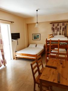 TV a/nebo společenská místnost v ubytování Villa Artemida