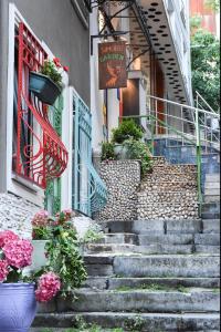 a row of stairs leading up to a balcony at Taksim The Marions Suite Hotel in Istanbul