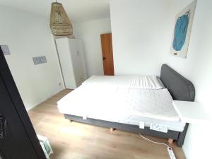 Postel nebo postele na pokoji v ubytování Ostseebrise