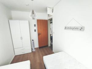 Postel nebo postele na pokoji v ubytování Ostseebrise