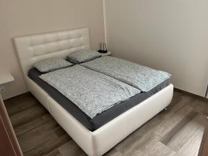 Postel nebo postele na pokoji v ubytování Rajczi Apartman