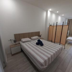 Posteľ alebo postele v izbe v ubytovaní MÁLAGA VELARDE cENTER