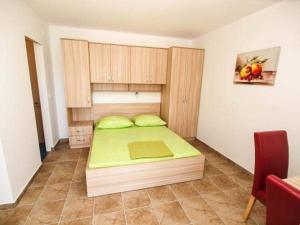 Postel nebo postele na pokoji v ubytování Apartman Nikolić 2