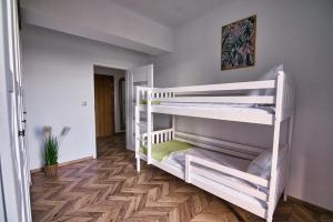 Ένα ή περισσότερα κρεβάτια σε δωμάτιο στο Kalimera 18 by Housine