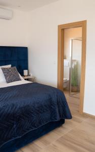 Posteľ alebo postele v izbe v ubytovaní Sea and mountain view apartments