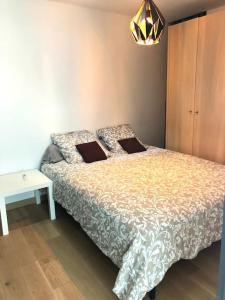 Posteľ alebo postele v izbe v ubytovaní Loft atypique 192m2, terrasse, aux portes de Lille