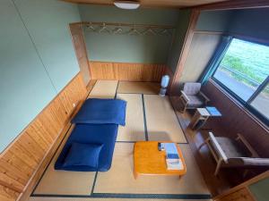 Posezení v ubytování 大砂荘 OZUNA CAMP and LODGE