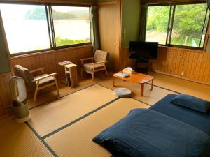 Posezení v ubytování 大砂荘 OZUNA CAMP and LODGE