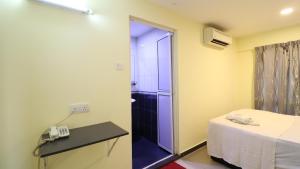 Postel nebo postele na pokoji v ubytování Hotel Seniman