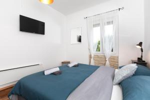 Postel nebo postele na pokoji v ubytování Villa AZUL