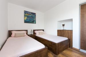 Postel nebo postele na pokoji v ubytování Villa AZUL