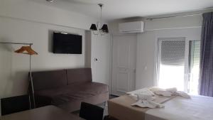 Postel nebo postele na pokoji v ubytování GIANNIS