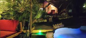 Jardín al aire libre en Viviendas Uso Turisitico, Al BUHAR