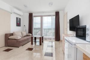 TV a/nebo společenská místnost v ubytování Hérics Apartman