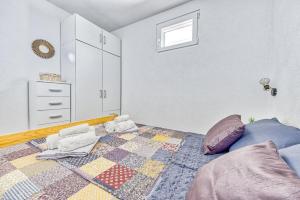 Posteľ alebo postele v izbe v ubytovaní Villa Grammy