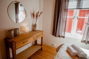 Ένα ή περισσότερα κρεβάτια σε δωμάτιο στο Kræmmervika Havn