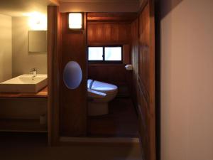 A bathroom at carafuru Japanese Old House