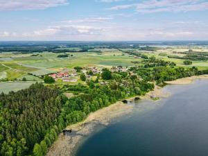 an aerial view of a town next to a body of water at Słoneczny Pagórek in Giżycko