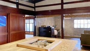 A kitchen or kitchenette at carafuru Japanese Old House
