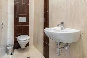 Kúpeľňa v ubytovaní Hérics Apartman