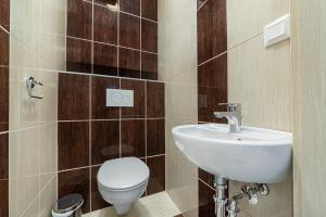 Kúpeľňa v ubytovaní Hérics Apartman