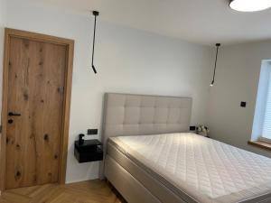 Postel nebo postele na pokoji v ubytování Villa Alexandra