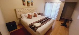 Hotel Mantas Cusco客房内的一张或多张床位