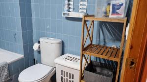 Koupelna v ubytování Apartamento familiar con piscina y wifi