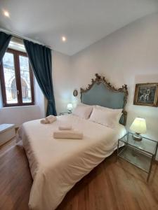 Postel nebo postele na pokoji v ubytování Casa Altieri
