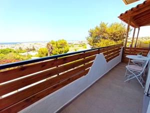 A balcony or terrace at Kallias Modern Seaview Apartment
